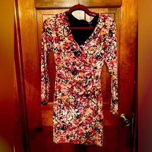 Guess women’s dress, soft sexy know, figure hugging.